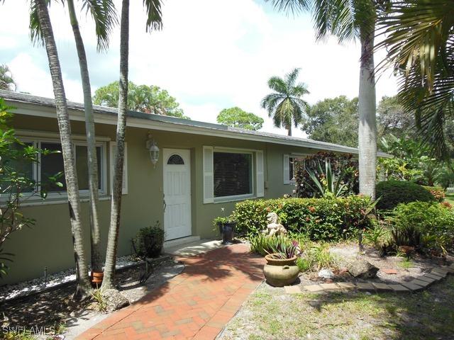 1396 Cooper Dr., Naples, FL