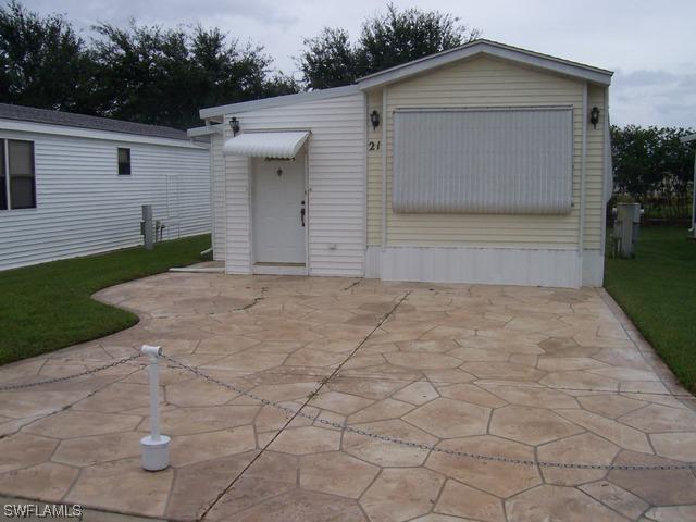 21 Bass Ln., Naples, FL 34114