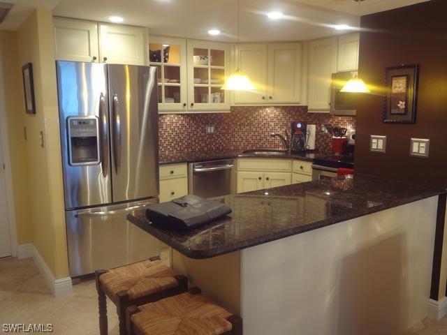 3 Bluebill Ave. #704, Naples, FL