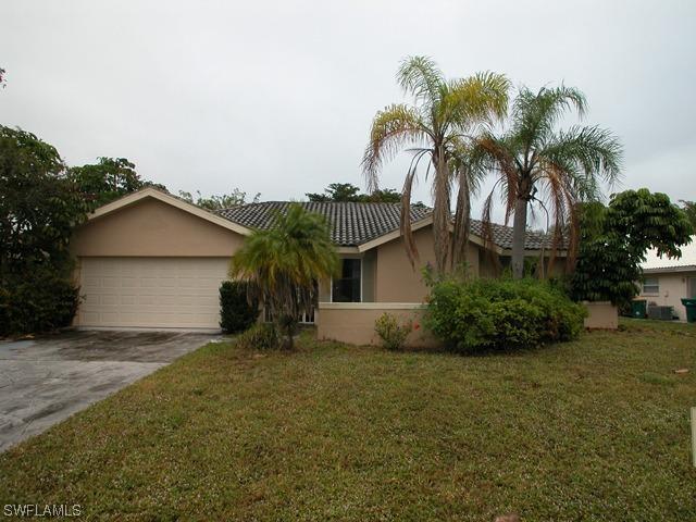 257 Baltusrol Dr., Naples, FL 34113