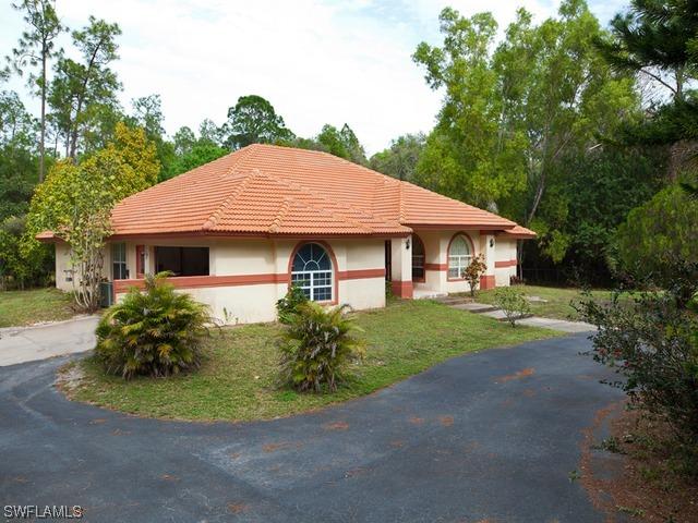 5705 Hidden Oaks Ln., Naples, FL 34119