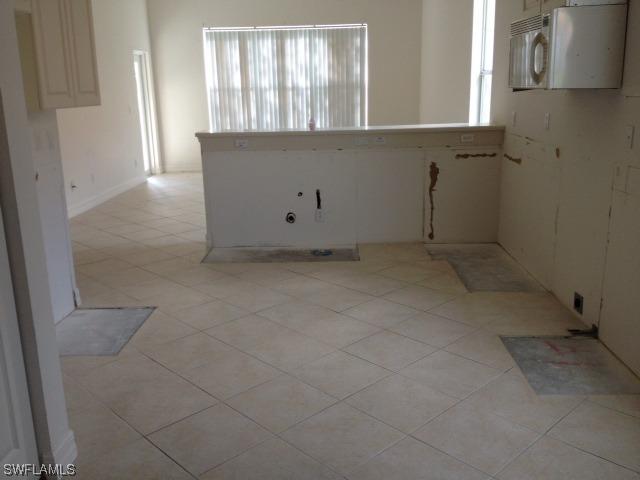 1607 Triangle Palm Ter., Naples, FL 34119