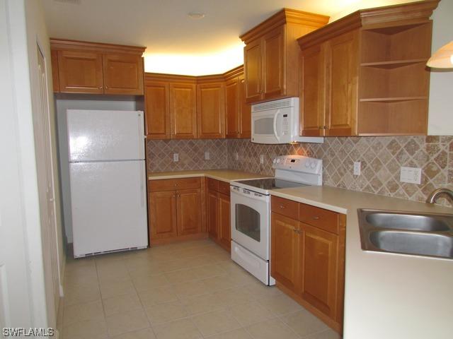 8597 Via Garibaldi Cir. #203, Estero, FL 33928