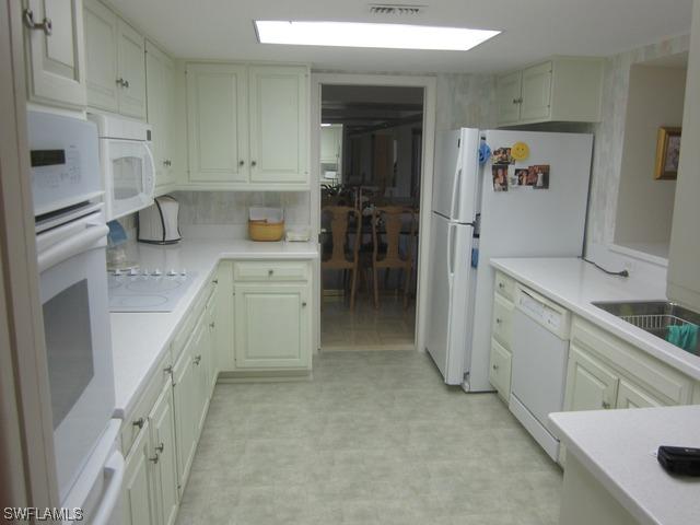 5601 Turtle Bay Dr. #203, Naples, FL