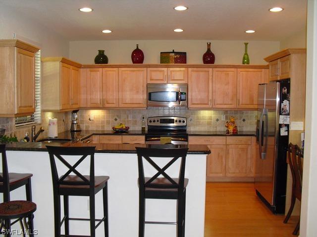 15582 Summit Place Cir., Naples, FL 34119