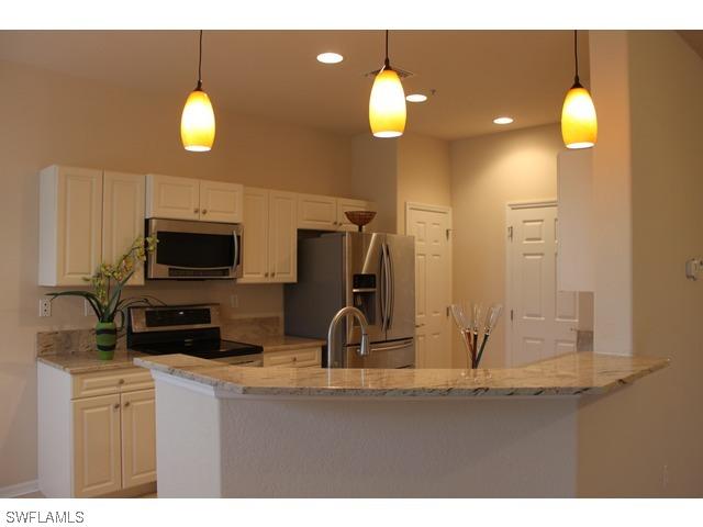 12858 Carrington Cir. #202, Naples, FL