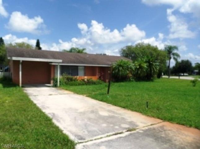 1403 Caywood Cir., Lehigh Acres, FL 33936
