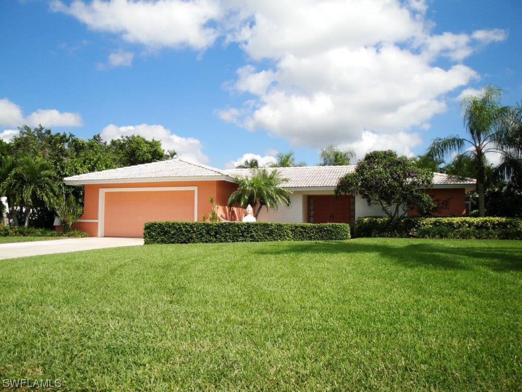 221 Baltusrol Dr., Naples, FL 34113