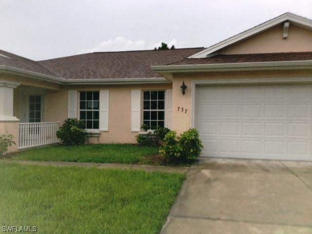 737 Manuel St., Lehigh Acres, FL 33974