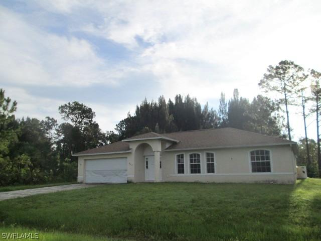214 Moore Ave., Lehigh Acres, FL 33936