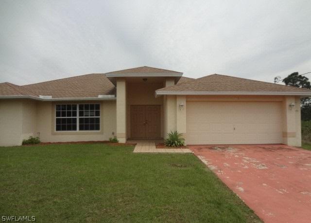 406 Wells Ave., Lehigh Acres, FL 33972