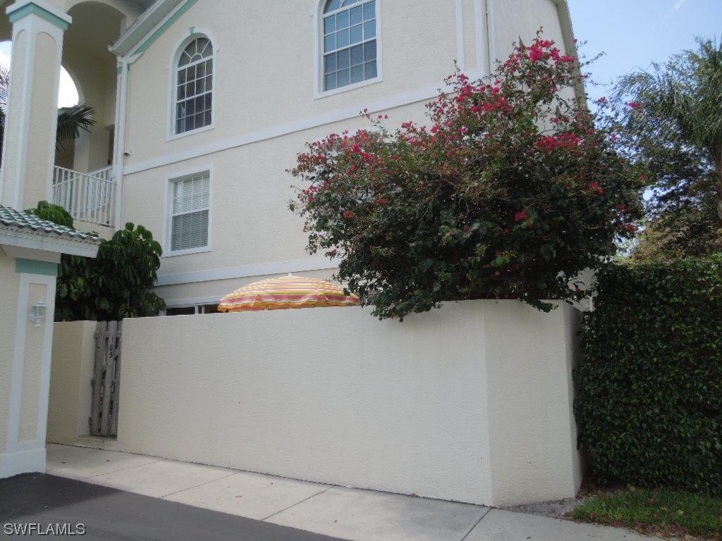 15435 Cedarwood Lane - 5-105, Naples, FL 34110