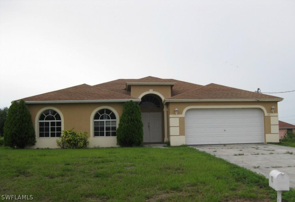 703 Milton Ave., Lehigh Acres, FL 33971