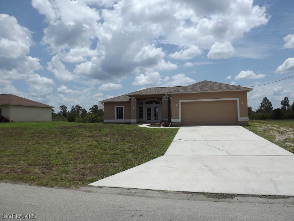 818 Cortez Ave., Lehigh Acres, FL 33972