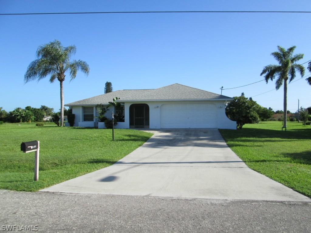 1423 Ford Cir., Lehigh Acres, FL 33936
