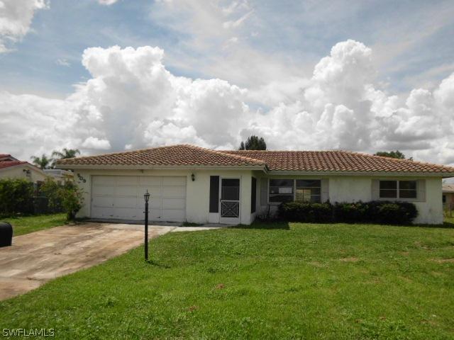 209 Lowry Ave., Lehigh Acres, FL 33936