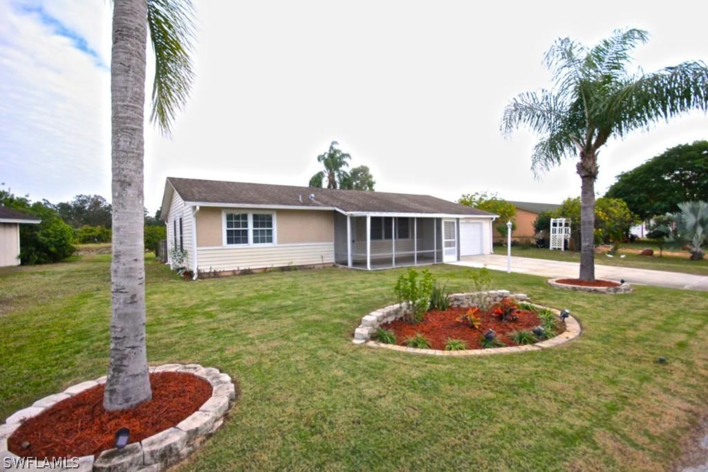 10715 Guavatree Ct., Lehigh Acres, FL 33936