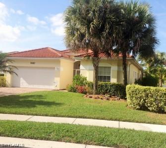 7687 Berkshire Pines Dr., Naples, FL 34104