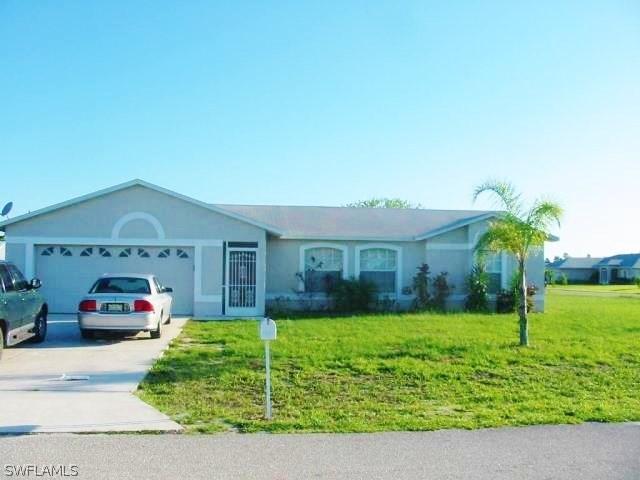1663 Cheshire Cir., Lehigh Acres, FL 33936