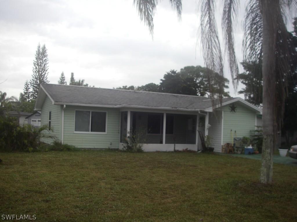 405 Morgan Cir., Lehigh Acres, FL 33936