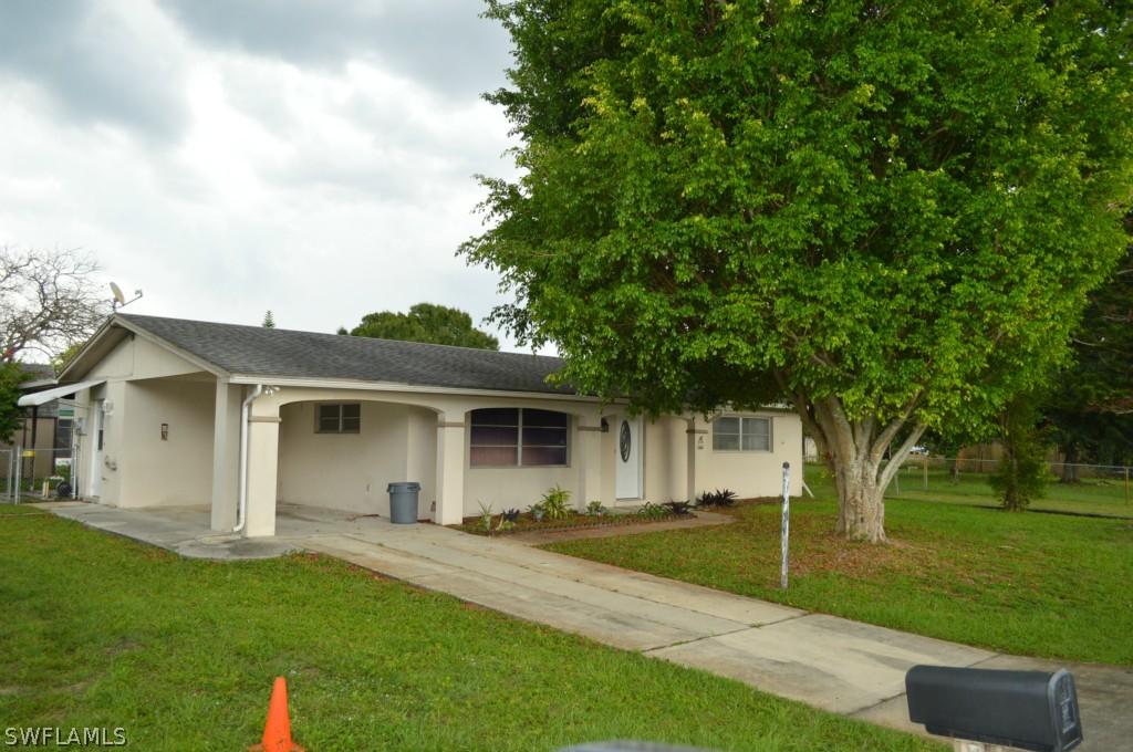 409 Morgan Cir., Lehigh Acres, FL 33936