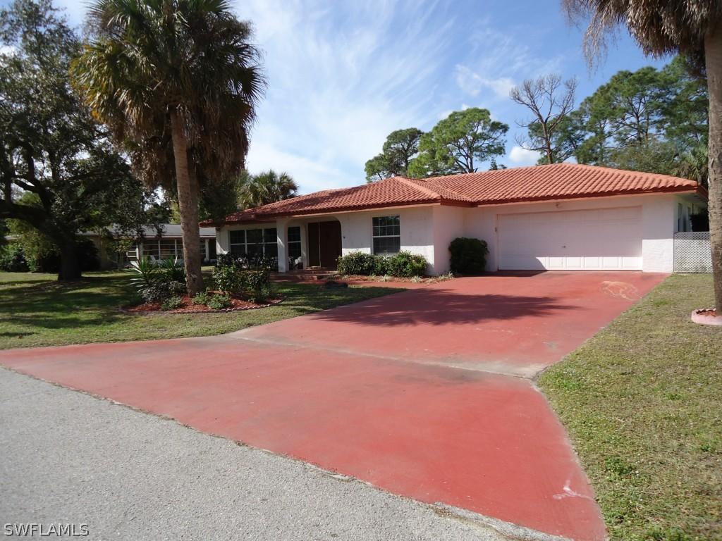 303 Lake Ave., Lehigh Acres, FL 33936