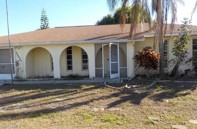 19486 Poppytree Ct., Lehigh Acres, FL 33936