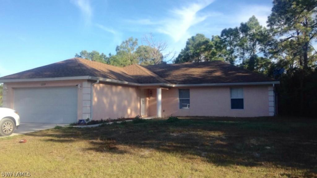 1239 Celtic St., Lehigh Acres, FL 33974