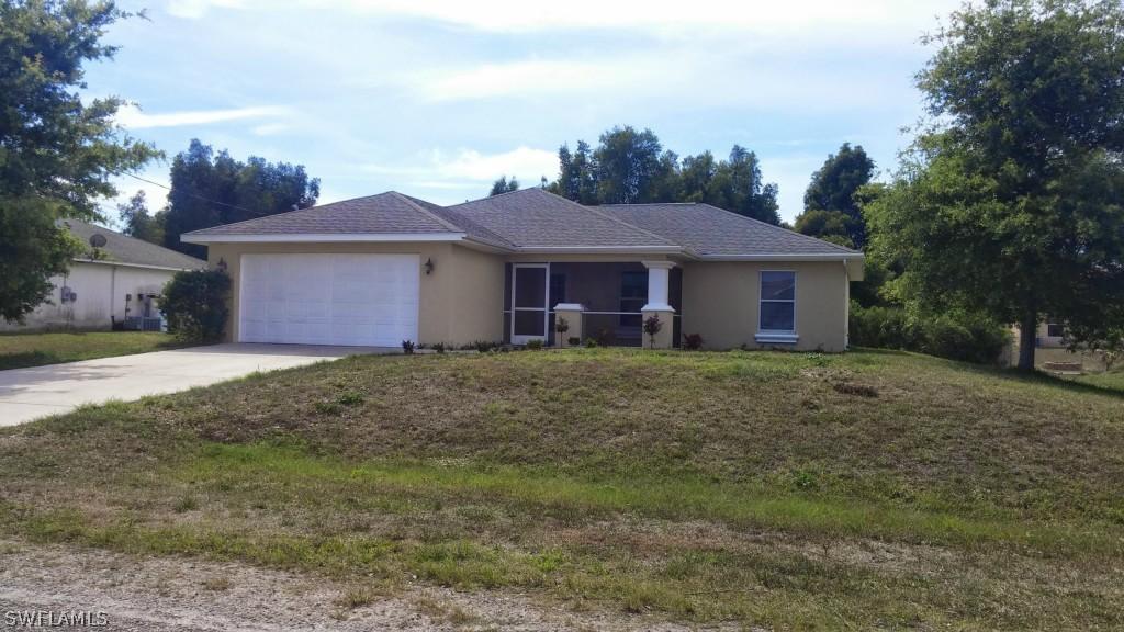 1121 Carlfield Ave., Lehigh Acres, FL 33971