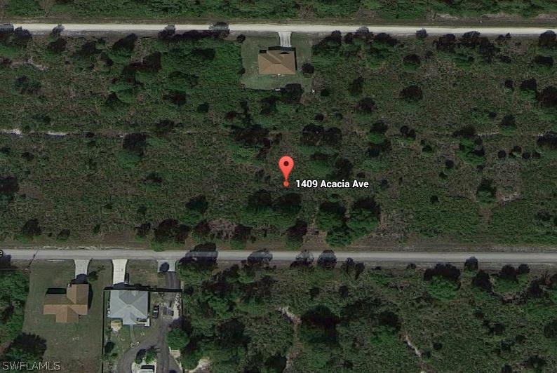 1409 Acacia Ave., Lehigh Acres, FL 33972