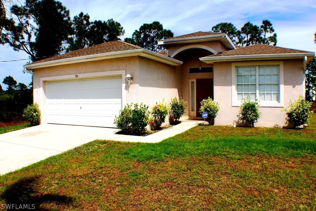 703 Joponica Ave., Lehigh Acres, FL 33974