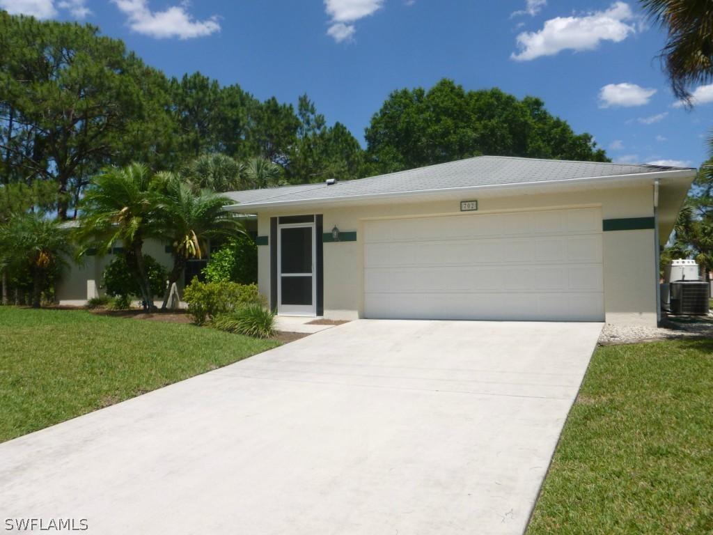 702 Plumosa Ave., Lehigh Acres, FL 33972