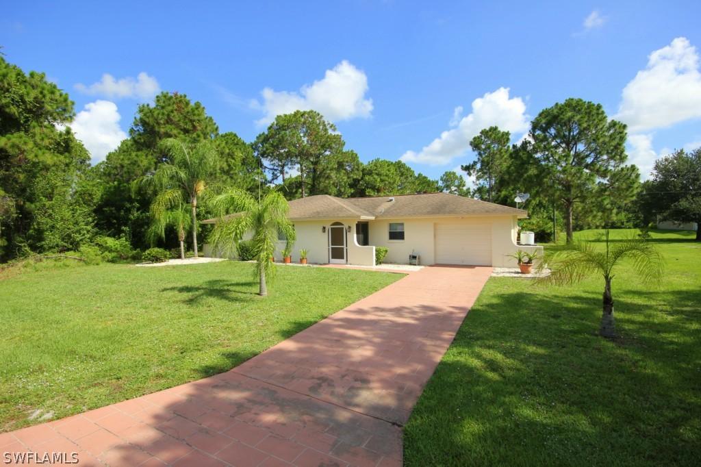 711 Long Lines Ln., Lehigh Acres, FL 33974