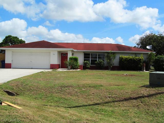 209 Eaglesmere Dr., Lehigh Acres, FL 33936