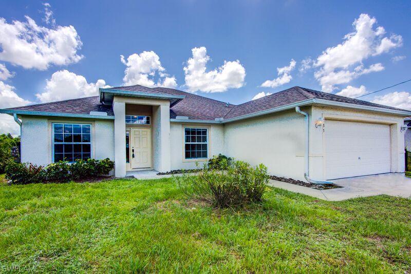933 Gunby Ave., Lehigh Acres, FL 33974