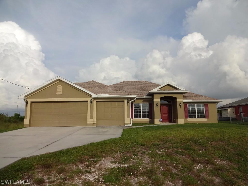 1027 Chadbourne Ave., Lehigh Acres, FL 33971