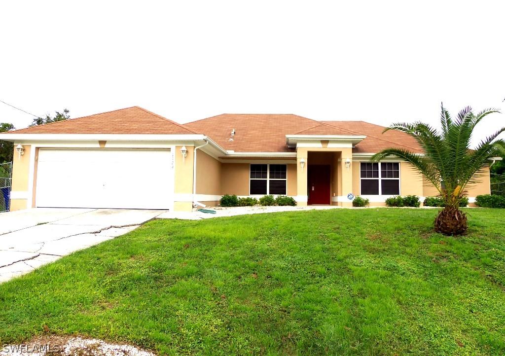1124 Carl Ave., Lehigh Acres, FL 33971