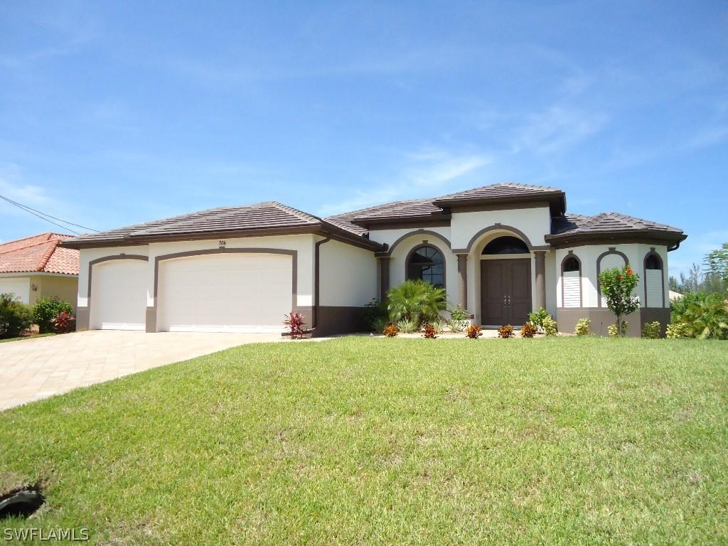 706 NW 38th Pl., Cape Coral, FL 33993