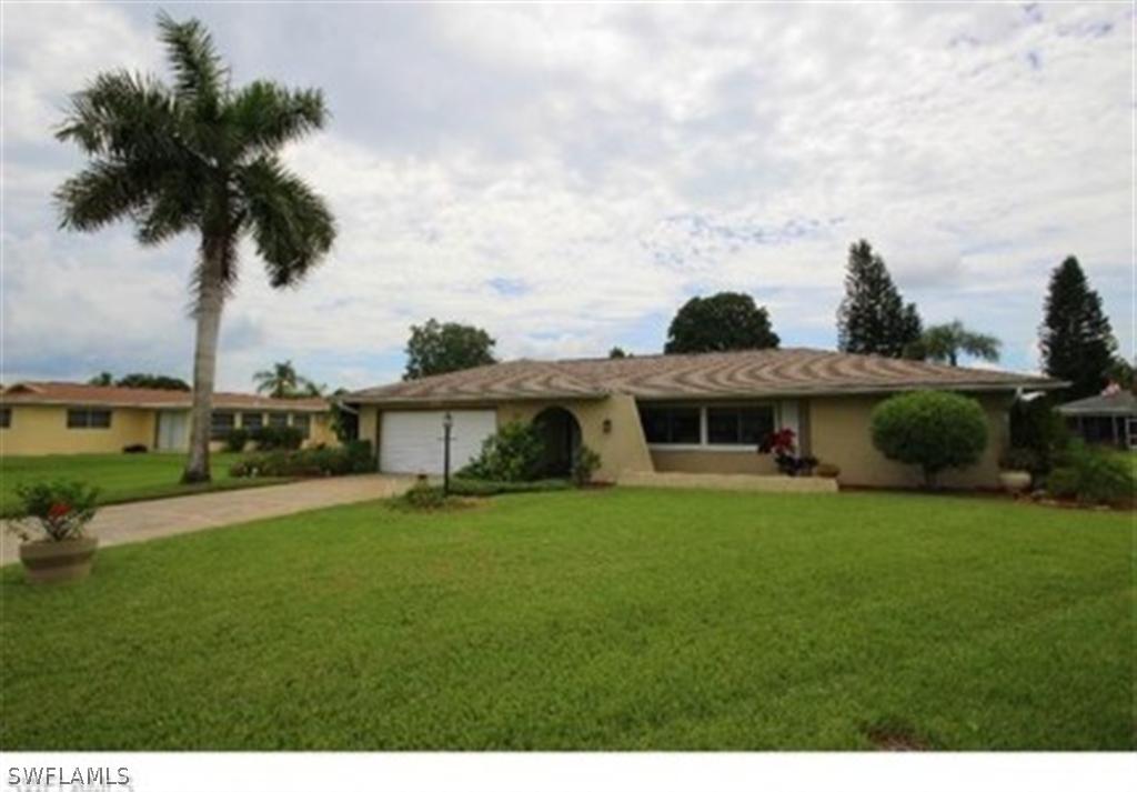 1517 Canal Pl., Lehigh Acres, FL 33936