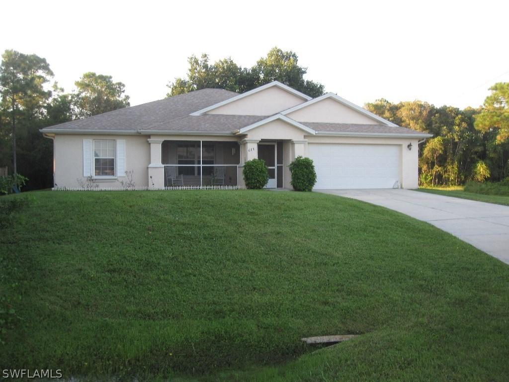 627 Foxchase Dr., Lehigh Acres, FL 33974