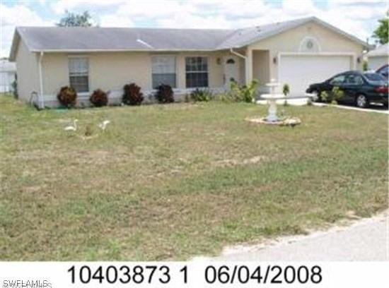 1650 Cheshire Cir., Lehigh Acres, FL 33936