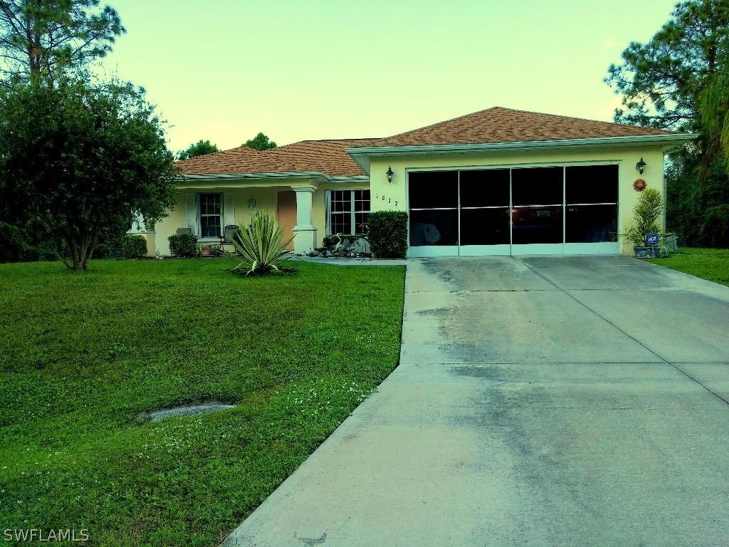 1017 Binkley St., Lehigh Acres, FL 33974
