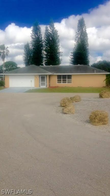 19497 Poppytree Ct., Lehigh Acres, FL 33936