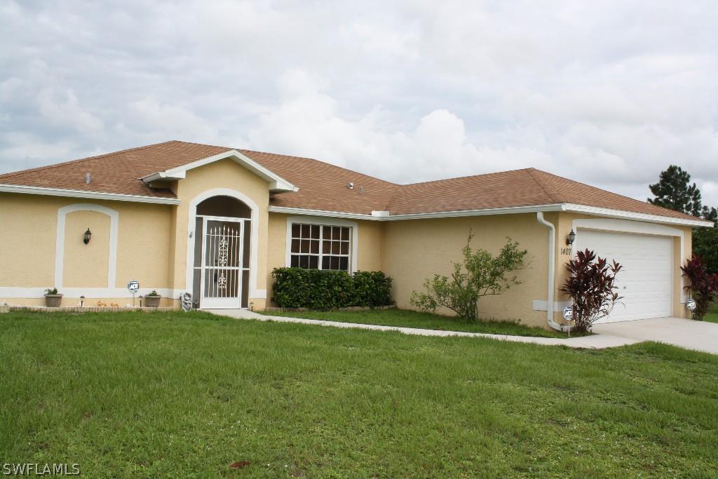 1407 Brian Ave., Lehigh Acres, FL 33976