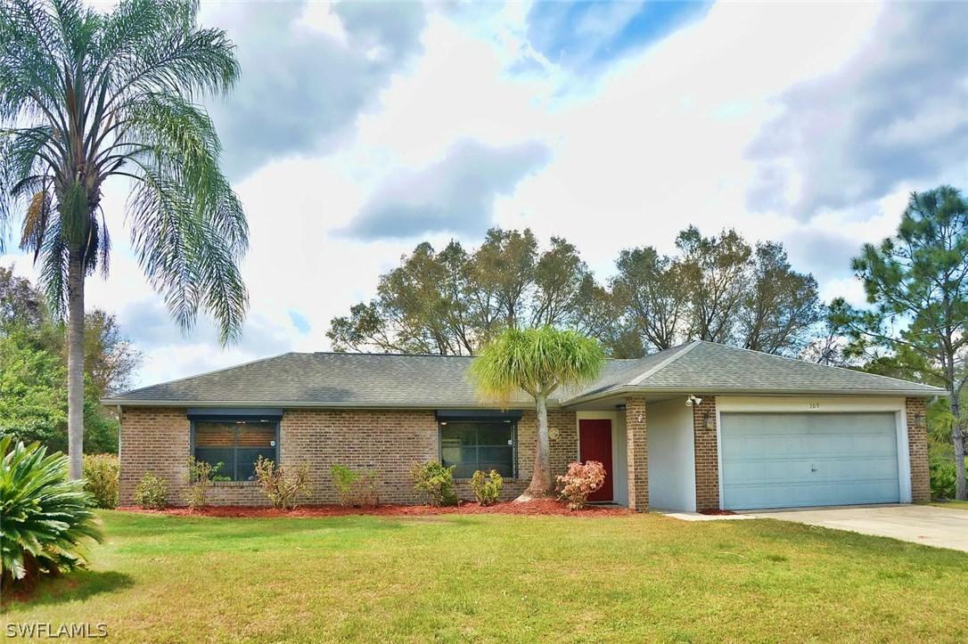 309 Wellington Ave., Lehigh Acres, FL 33936