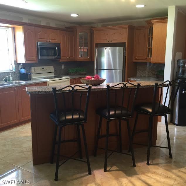 303 Davis Rd., Lehigh Acres, FL 33936