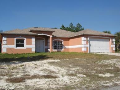 703 Poinsettia Ave., Lehigh Acres, FL 33972