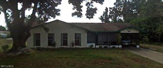 204 Lincoln Ave., Lehigh Acres, FL 33936