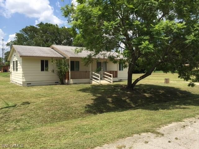 715 W Cleveland Ln., Lehigh Acres, FL 33936