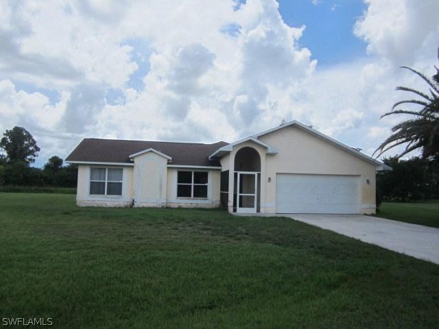 215 Eaglesmere Dr., Lehigh Acres, FL 33936